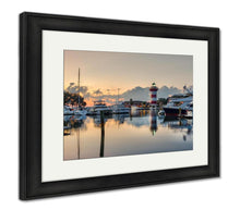 Load image into Gallery viewer, Framed Print, Hilton Head Island And Its Iconic Lighthouse Lit Up At Sunset With A Glass Like - Beijooo